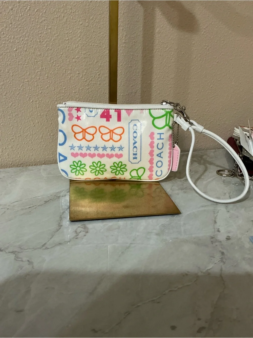 Coach Poppy Wristlet White Coated Canvas With Colorful Floral & Butterfly Print